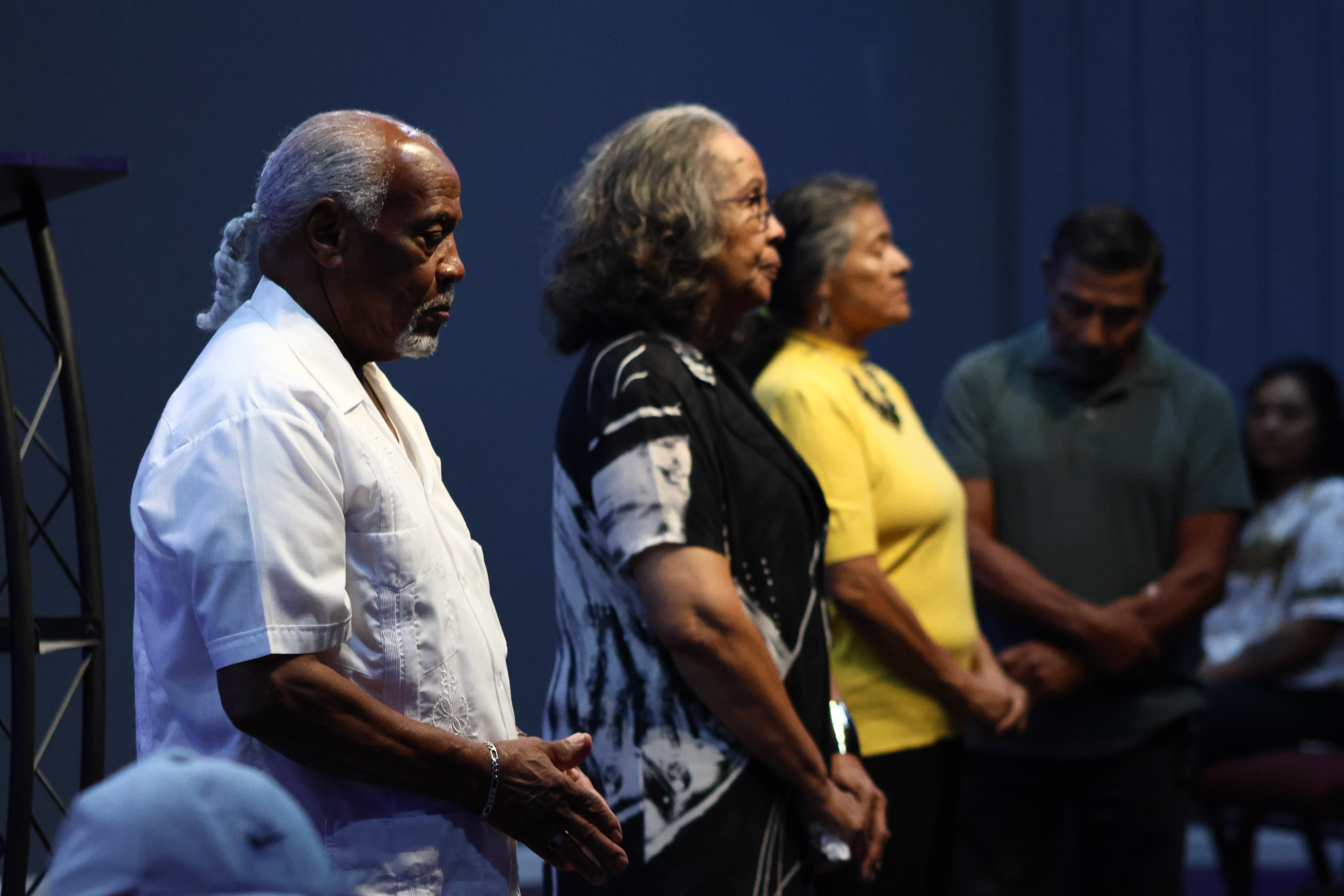 Congregation standing in worship